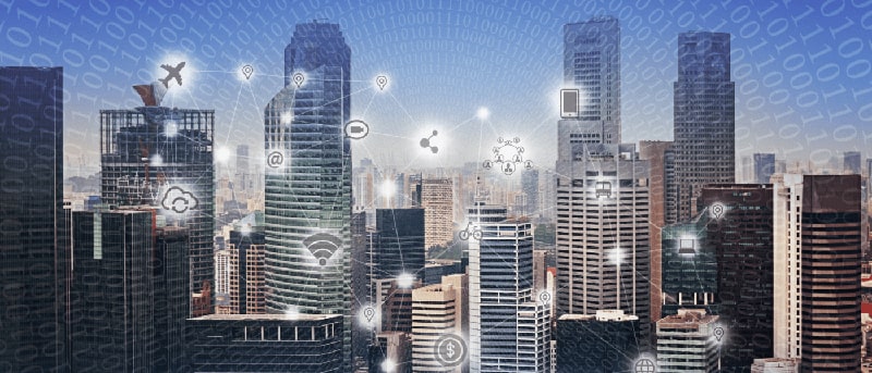 picture of a city with many buildings with icons overlayed