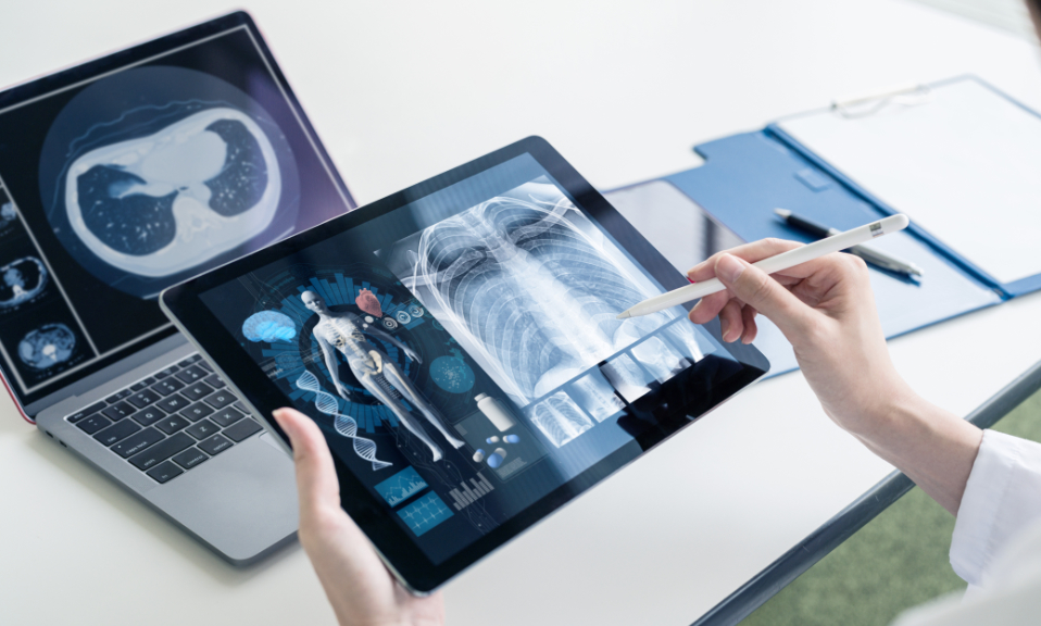person holding connected medical device